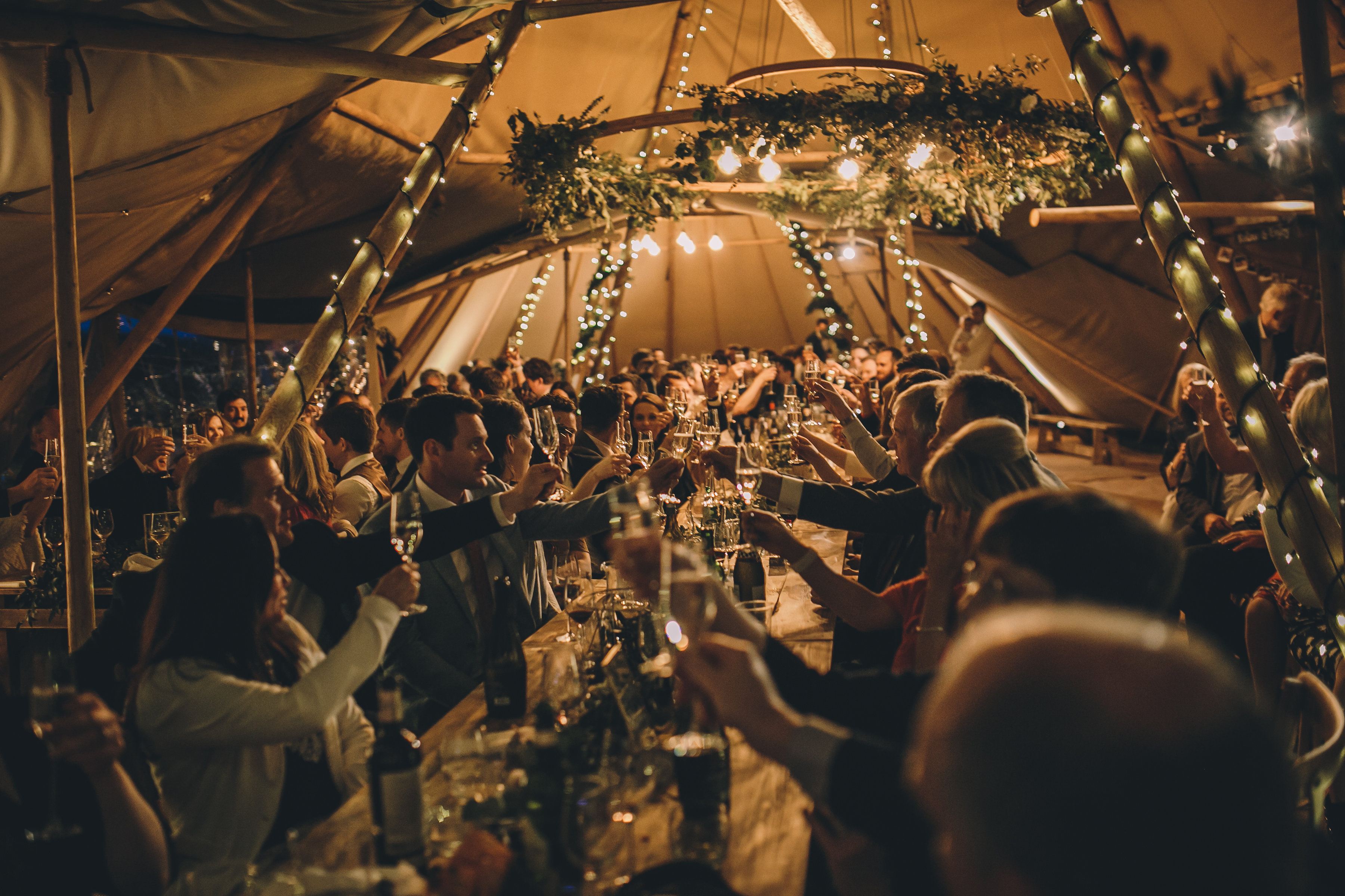 Wedding tipi with tressle tables