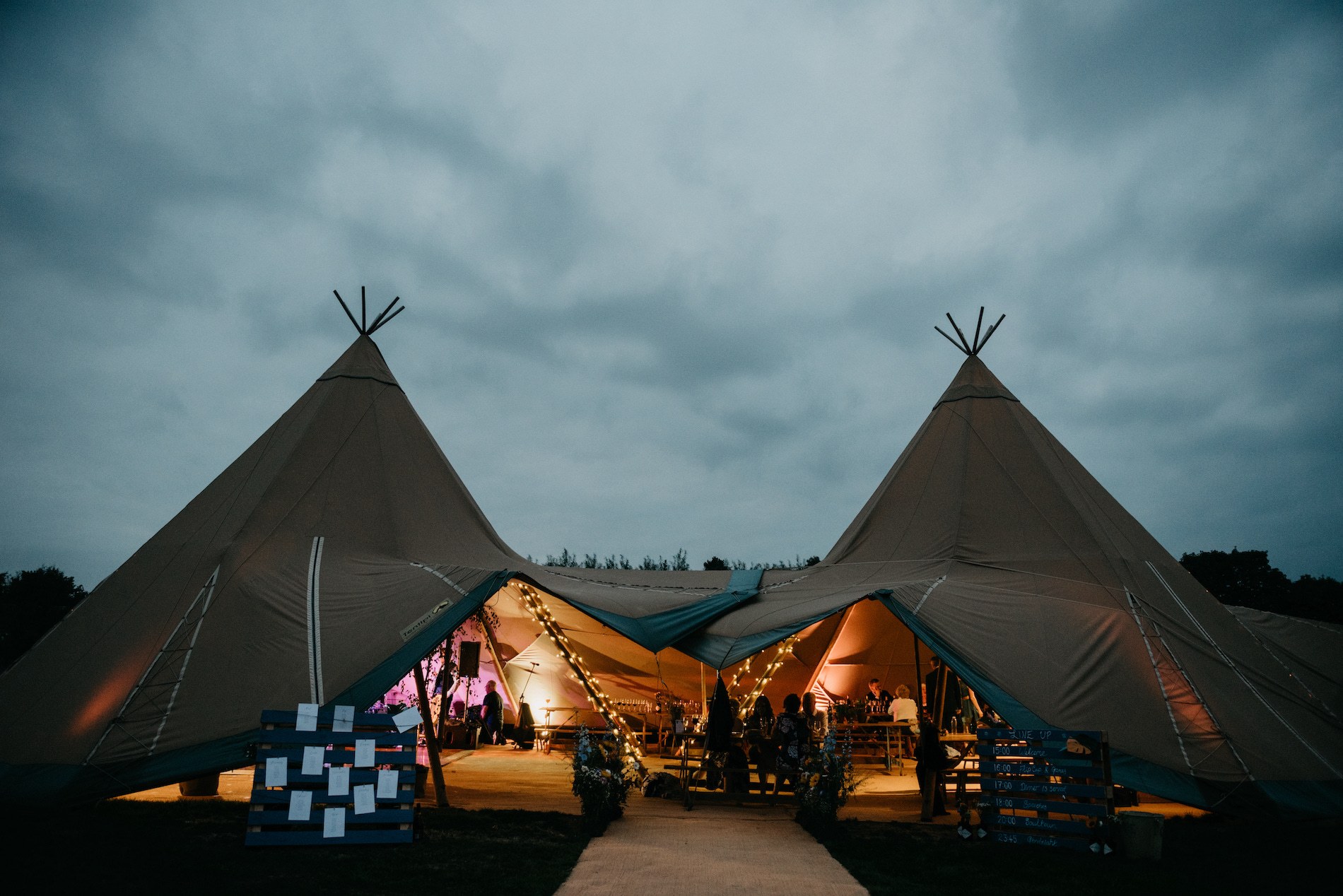wedding tipis at night with lighting