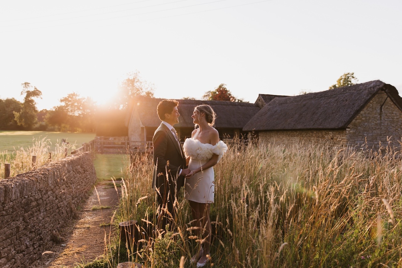 Bride and Groom at outdoor wedding venue at sunset - Buffalo Tipi and Marquee hire - West Country and Cotswolds