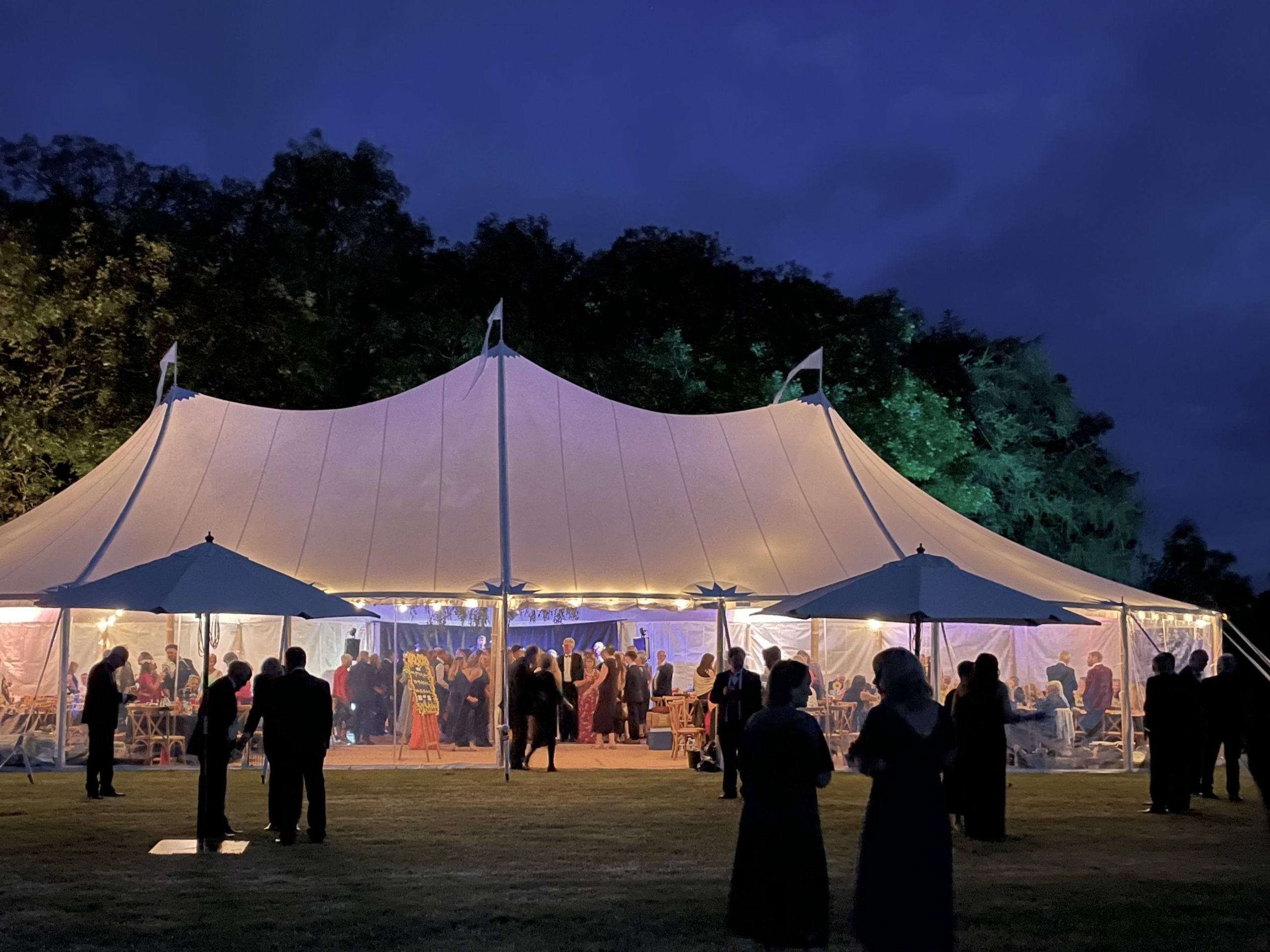 Sailcloth tent with lighting at night - Buffalo Tipi and Marquee hire - West Country and Cotswolds