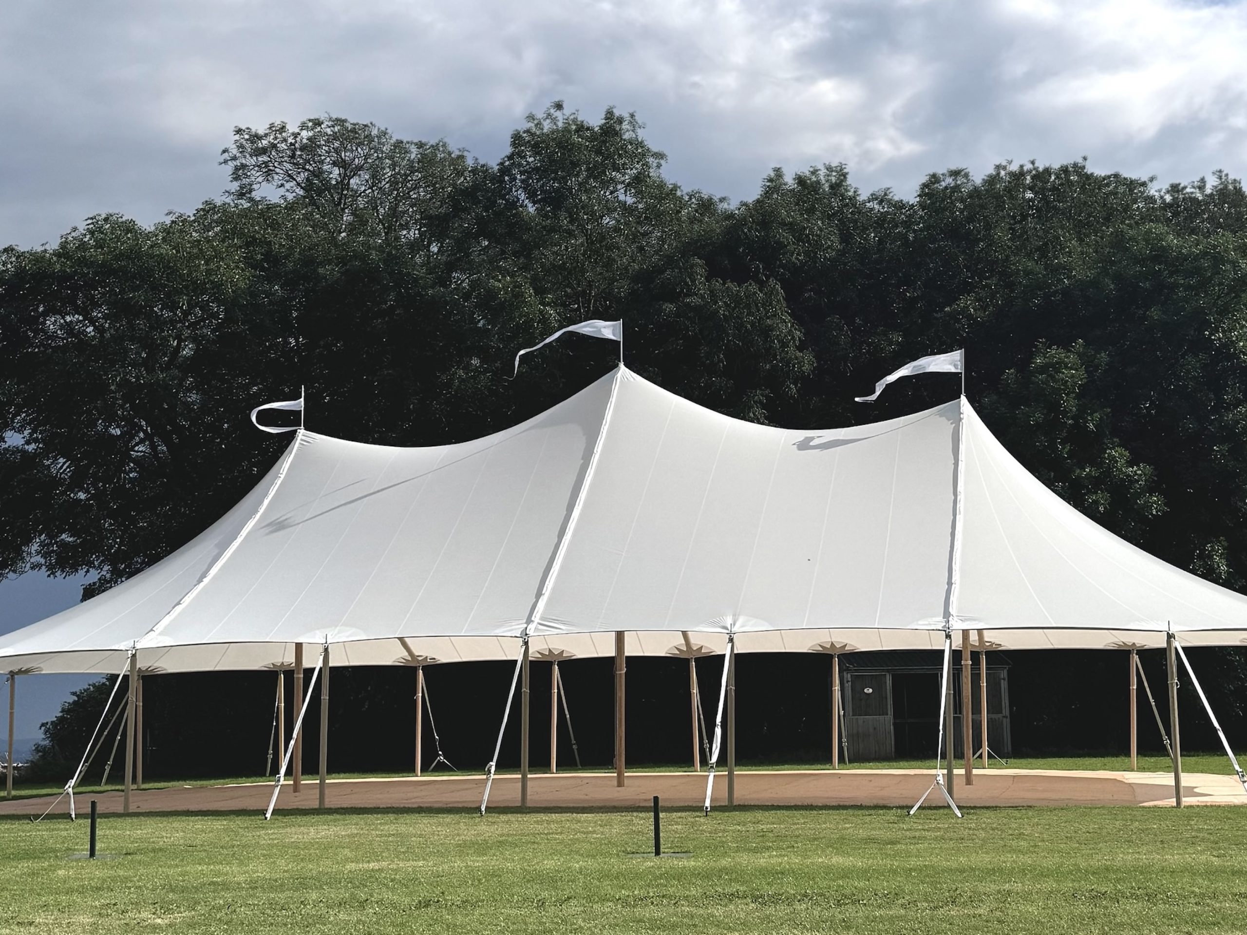 Sailcloth tent with open sides - Buffalo Tipi and Marquee hire - West Country and Cotswolds